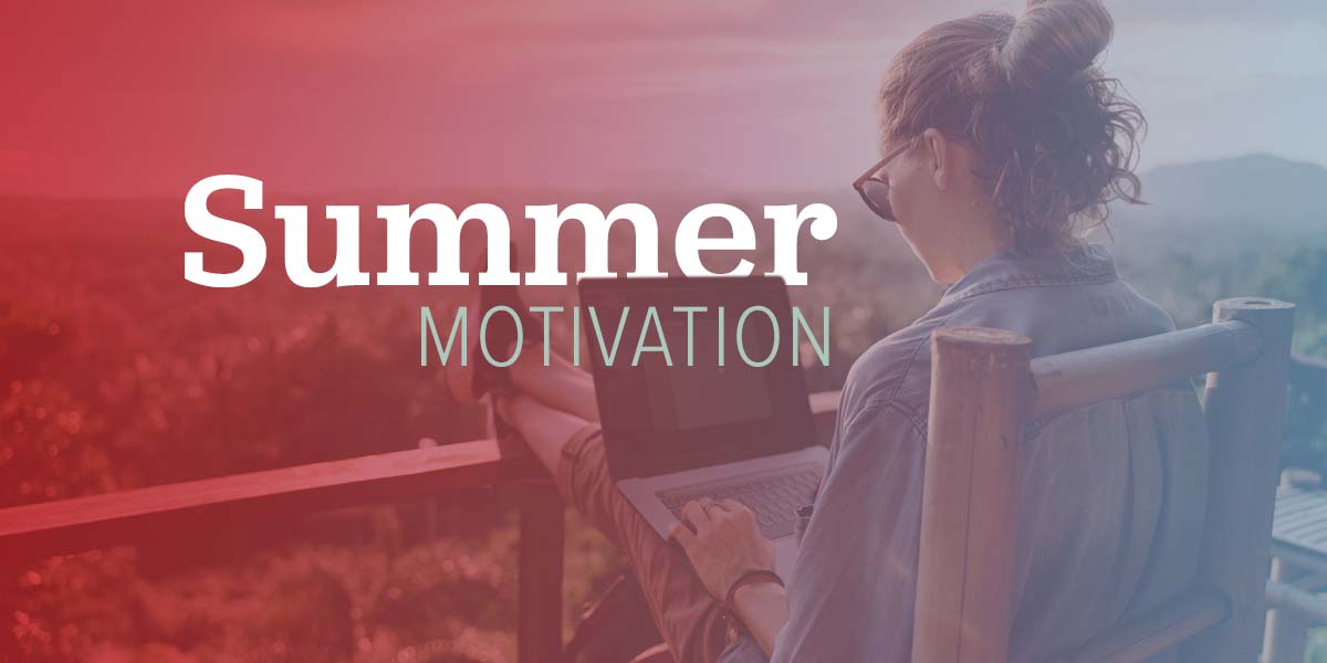 A person working on a laptop during a summer day.